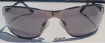 Uvex Tomcat Safety Glasses Z87+ Gray Lenses No Mirror. Fixed Price $54.99.