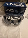 New In Box Uvex S3400X Flex Seal Blue Body With Clear Lens Safety Goggles. Fixed Price $12.00.