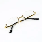 Luxury Men's Rimless Gold Frame Retro School Hip Hop Clear Lens Glasses. Fixed Price $20.99.