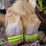Dept Black Firefighter Helmet W/ Tan Turnout Coat & Pants 4T June 2010. Fixed Price $100.00.
