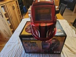 Chicago Electric Welding Auto Darkening Helmet Red Design Model 63121. Fixed Price $30.99.