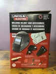 Lincoln Electric Auto Darkening Welding Helmet Kit With Accessories Model KH977. Fixed Price $119.99.
