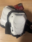 Husky White Foam Memory Hard Cap Knee Pad With Adjustable Straps. Fixed Price $27.99.