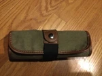 Global Art Canvas Roll Up Case Olive W/brown Trim Holds To 36 Pencils. Fixed Price $30.00.