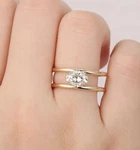 East To West Double Band Solitaire Sterling Silver Oval Moissanite Women's Ring. Fixed Price $225.00.
